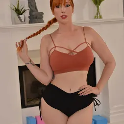 Lauren Phillips in 'VR Naughty America' Redhead MILF Lauren Phillips is in need of a good cock for her mouth and wet, tight pussy! (Thumbnail 1)